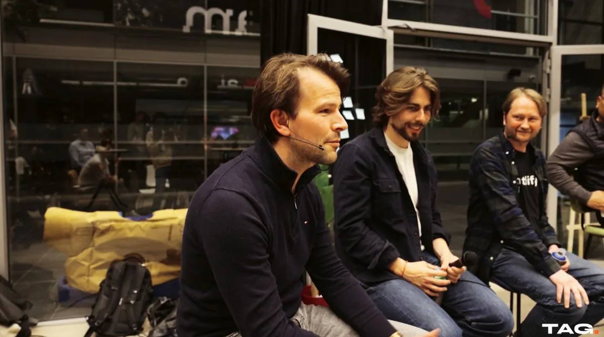 The fireside chat with Matt Biilmann, Netlify backdrop behind the stage