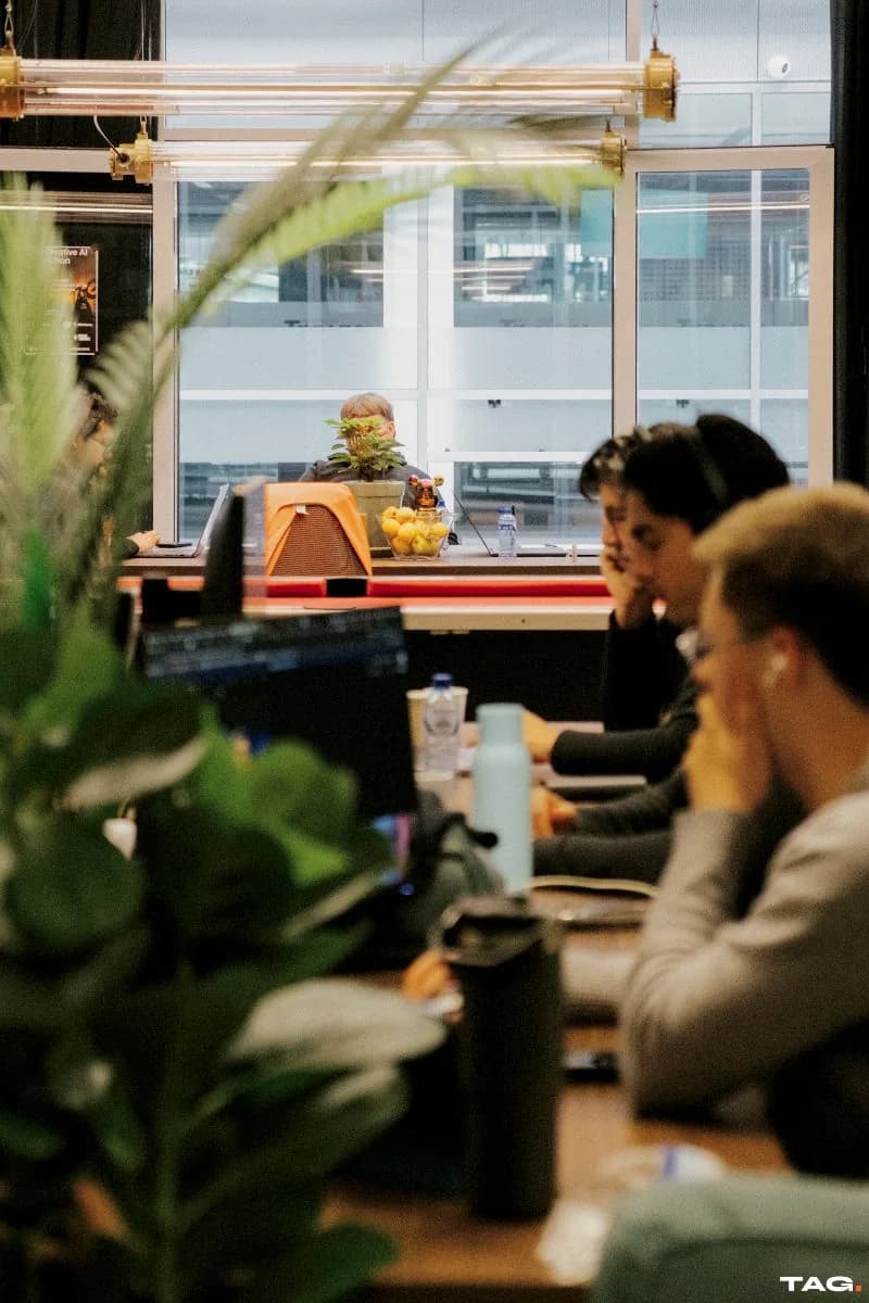 Heads down at the window desks
